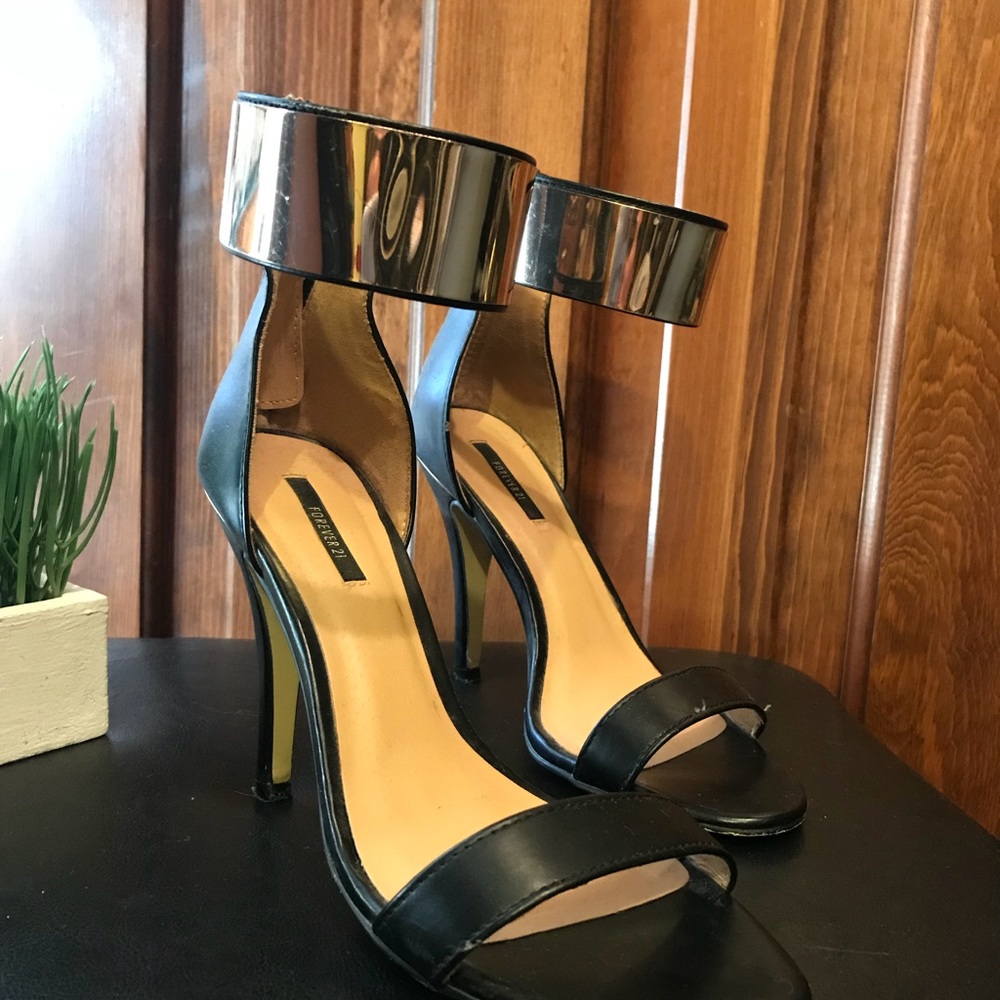 Gold bar ankle strap pumps